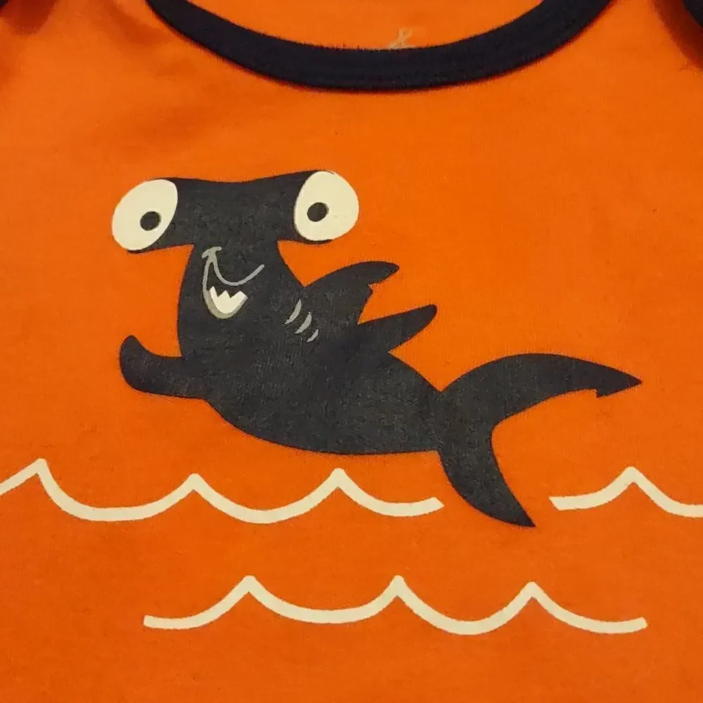 Lullaby 6-9 mo onesie with hammerhead shark, orange with navy trim snap crotch‎